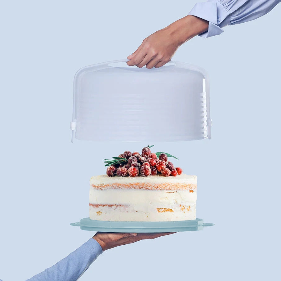 Round cake taker from TuppAfrica's Exclusive Collection, featuring a sleek, durable design for serving cakes elegantly.